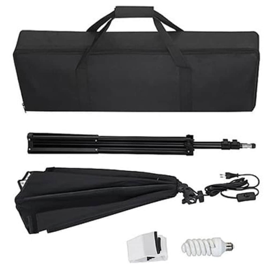 Set de estudio fotográfico con telón de fondo e iluminación