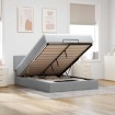 Cama otomana con colchón LED gris claro 140x190 cm tela