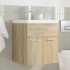 Mueble de baño con lavabo incorporado y grifo roble