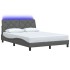 Estructura de cama con LED sin colchón gris oscuro 140x200