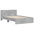 Estructura de cama cabecero y luces LED gris hormigón