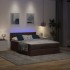 Cama otomana con colchón LED marrón oscuro 140x190 cm