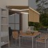 Toldo retráctil manual con persiana amarillo y blanco 3,5x2,5