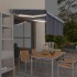 Toldo retráctil manual con persiana y LED azul y blanco 3x2,5