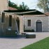 Toldo retráctil manual con LED gris antracita 400x300