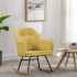 Silla mecedora de terciopelo amarillo