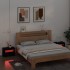 Mesitas de noche con luces LED 2 uds negro 60x35x40