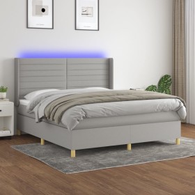 Cama box spring colchón y luces LED tela gris claro 160x200