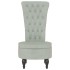 Sillón de respaldo alto con botones terciopelo gris