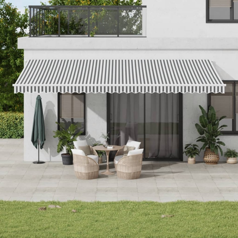 Toldo retráctil manual gris antracita y blanco 600x350