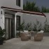 Toldo retráctil automático con luces LED burdeos 450x300