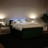 Cama box spring con colchón terciopelo verde oscuro 140x200