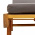 Tumbona con cojín y mesa madera maciza de