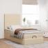 Estructura de cama otomana con colchón tela crema