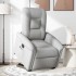 Sillón reclinable elevable de tela gris