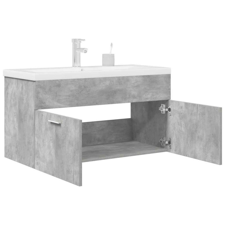 Mueble de baño con lavabo incorporado y grifo gris