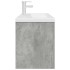 Mueble de baño con lavabo incorporado y grifo gris