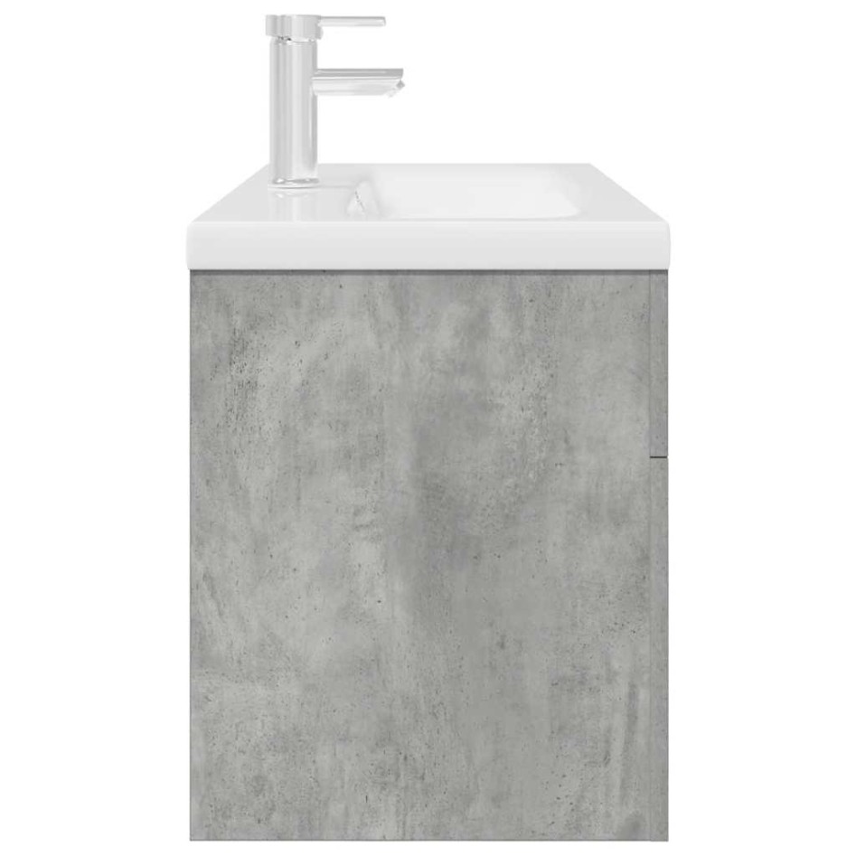 Mueble de baño con lavabo incorporado y grifo gris