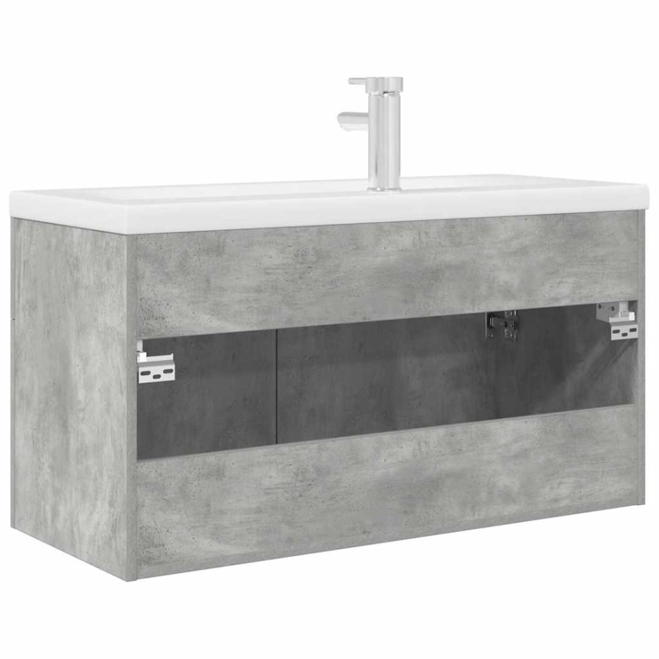 Mueble de baño con lavabo incorporado y grifo gris