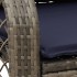Silla mecedora de jardín con cojines ratán sintético