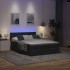 Cama otomana con colchón y luces LED Tela negra 140x200