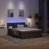 Cama otomana con colchón LED marrón oscuro 140x190 cm