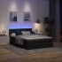 Cama otomana con colchón y luces LED Tela negra 140x200
