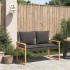 Banco de jardín con cojín ratán sintético negro y madera