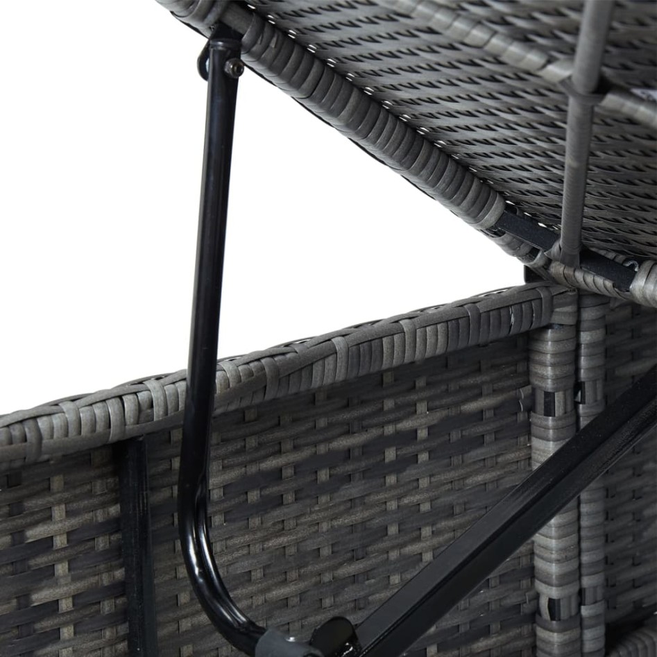 Tumbona con cojín y mesita de ratán sintético