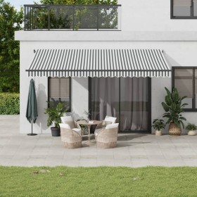 Toldo retráctil manual gris antracita y blanco 500x350