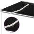 Toldo retráctil manual con luz LED gris antracita 500x300