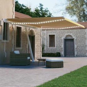Toldo retráctil manual con LED amarillo y blanco 450x300