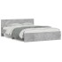 Estructura de cama con cabecero gris hormigón