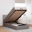 Cama otomana con colchón y luces LED tela gris taupé 90x200 cm