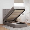 Cama otomana con colchón y luces LED tela gris taupé 90x200 cm