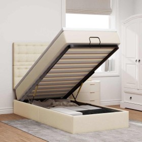 Estructura de cama otomana con colchón tela crema