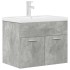 Mueble de baño con lavabo incorporado y grifo gris