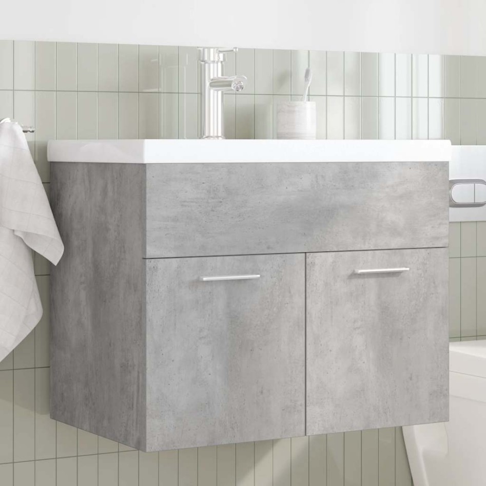 Mueble de baño con lavabo incorporado y grifo gris
