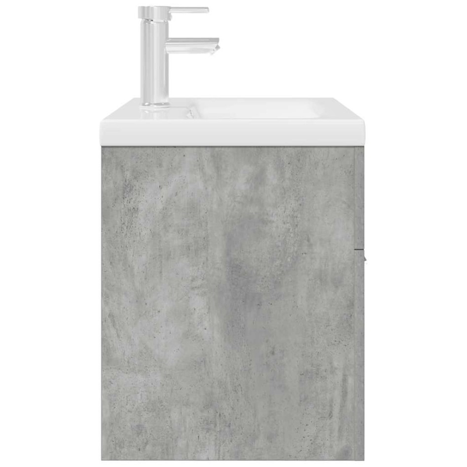 Mueble de baño con lavabo incorporado y grifo gris