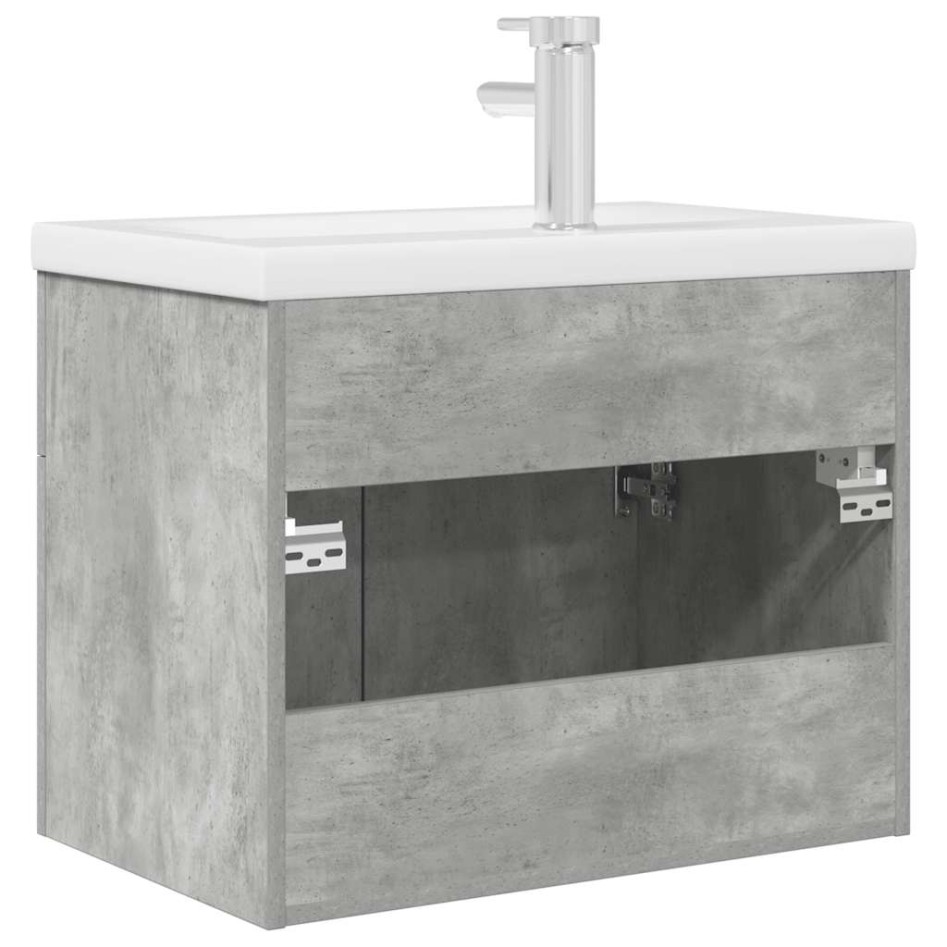 Mueble de baño con lavabo incorporado y grifo gris