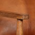 Sillón de cuero auténtico marrón con madera de