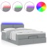 Cama otomana con colchón LED gris claro 140x190 cm