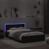 Estructura de cama con cabecero y luces LED negro 140x200