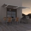 Toldo retráctil manual con luz LED color crema 600x300 cm