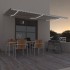 Toldo manual retráctil con LED color crema 600x350