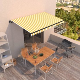 Toldo retráctil manual amarillo y blanco 450x300