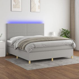 Cama box spring colchón y luces LED tela gris claro 160x200