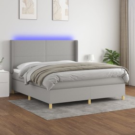 Cama box spring colchón y luces LED tela gris claro 160x200