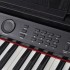 Piano digital de 88 teclas con pedales negro tabla