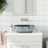 Lavabo sobre encimera ovalado cerámica negro y azul 47x33x13